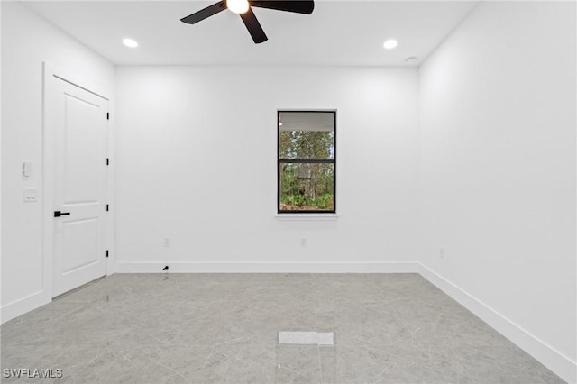 spare room featuring ceiling fan