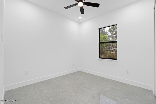 spare room featuring ceiling fan