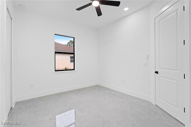 unfurnished room with ceiling fan