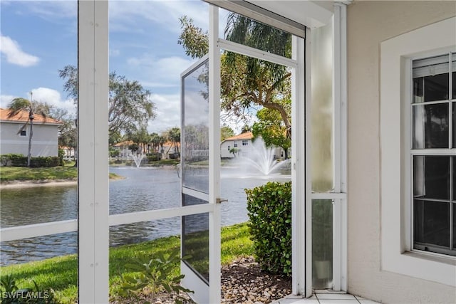 entryway with a water view