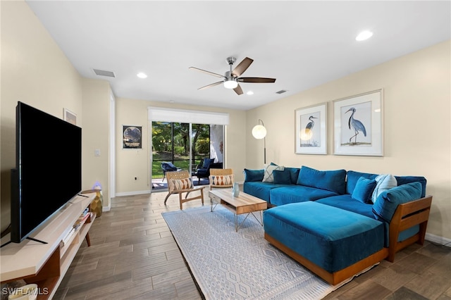 living room featuring ceiling fan