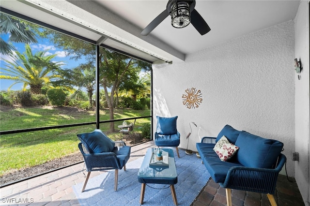 sunroom / solarium with ceiling fan