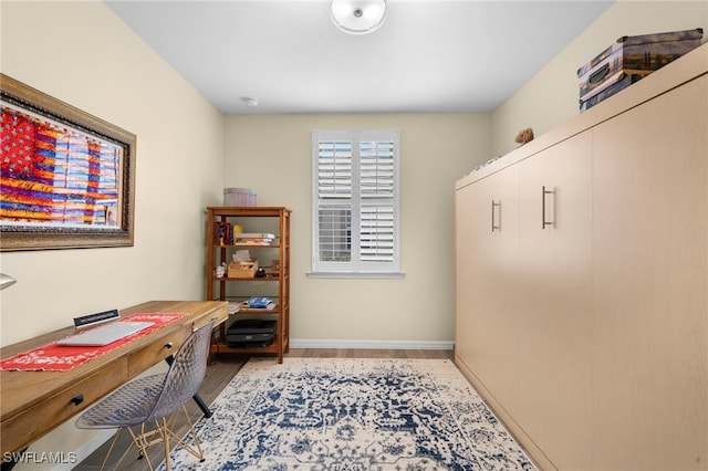 home office with light wood-type flooring