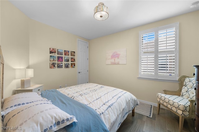 bedroom featuring wood-type flooring