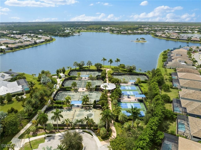 bird's eye view with a water view