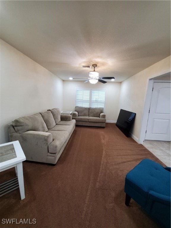 living room with carpet and ceiling fan