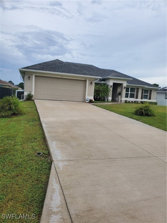 ranch-style home with a garage, central air condition unit, and a front lawn