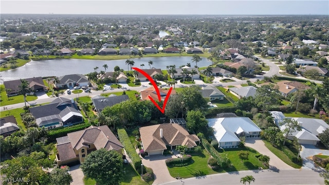 birds eye view of property featuring a water view