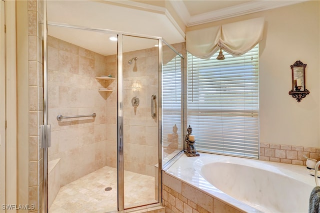 bathroom featuring ornamental molding and plus walk in shower