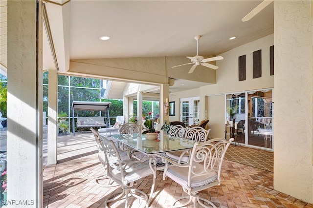 dining area with lofted ceiling and ceiling fan