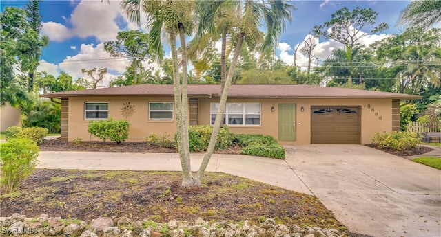 single story home with a garage