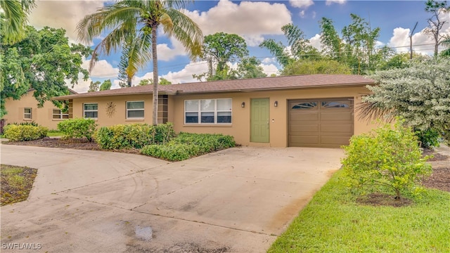 ranch-style home with a garage