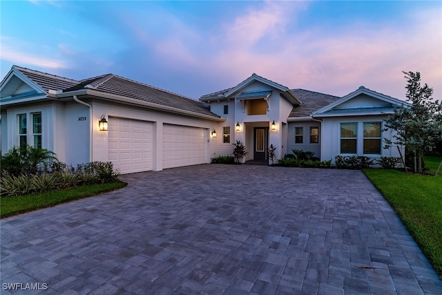 view of front of home with a garage