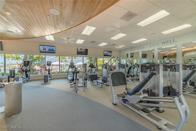 exercise room featuring carpet floors and ceiling fan