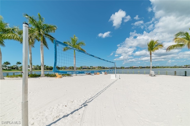 view of home's community featuring a water view and volleyball court