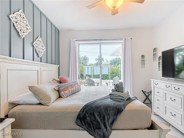 bedroom featuring ceiling fan and access to exterior