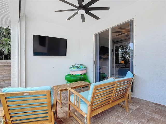 view of patio with an outdoor hangout area and ceiling fan