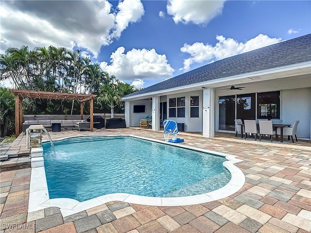 view of pool featuring a patio, a pergola, ceiling fan, and pool water feature