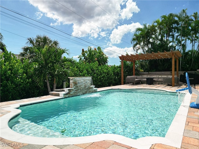 view of swimming pool featuring pool water feature, a pergola, and a patio area