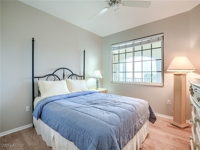 bedroom featuring ceiling fan and light hardwood / wood-style flooring