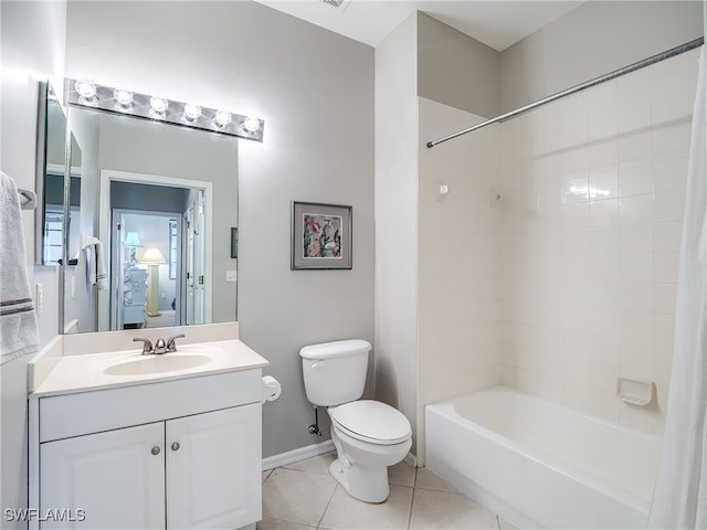 full bathroom with tile patterned flooring, vanity, shower / bath combo with shower curtain, and toilet