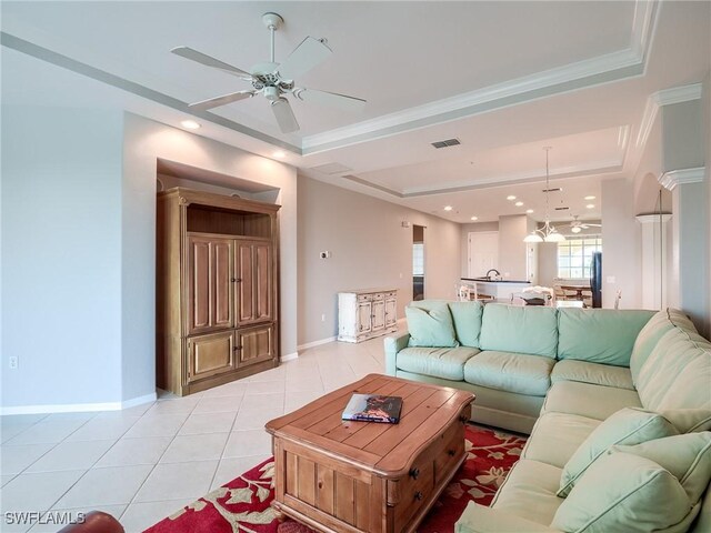 20011 Sanibel View Cir # 302, Fort Myers, FL 33908 - living area featuring ceiling fan, light tile patterned flooring, recessed lighting, a tray ceiling, and ornamental molding