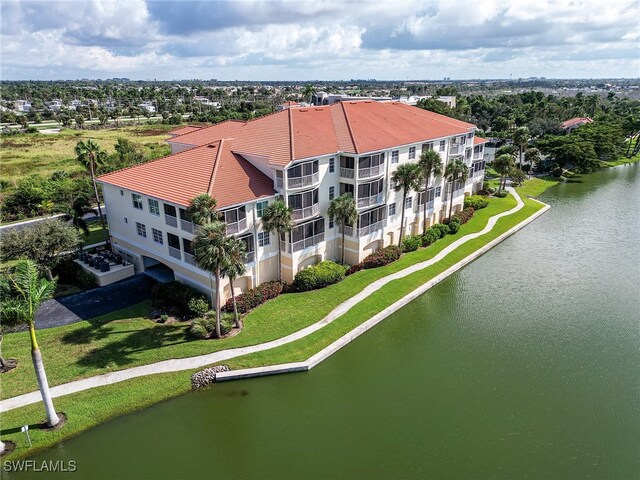 drone / aerial view with a water view