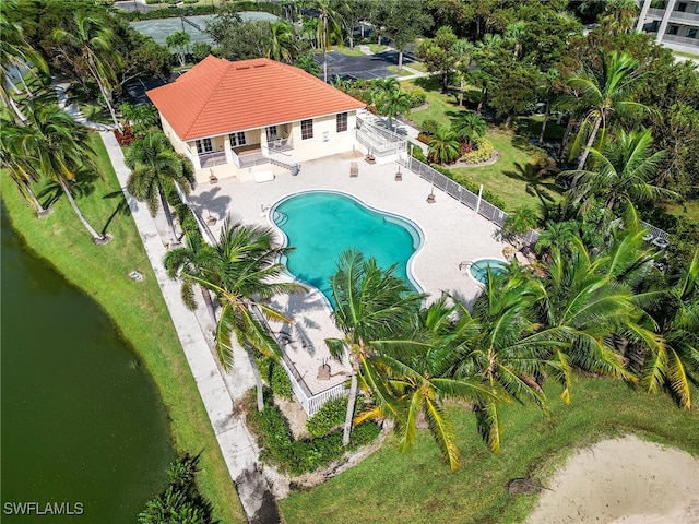 birds eye view of property featuring a water view