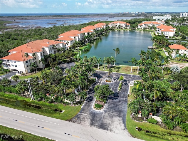 drone / aerial view with a water view