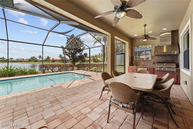 view of swimming pool featuring grilling area, ceiling fan, a patio, a lanai, and a water view