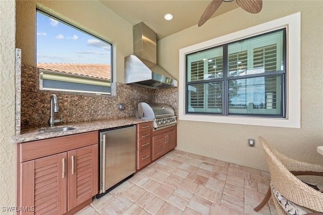 view of patio featuring an outdoor kitchen, sink, grilling area, and ceiling fan