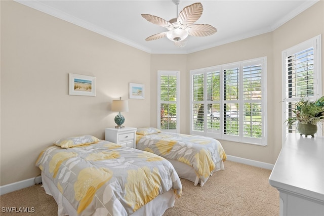 bedroom featuring ceiling fan, crown molding, multiple windows, and light colored carpet