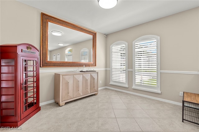 interior space featuring light tile patterned floors