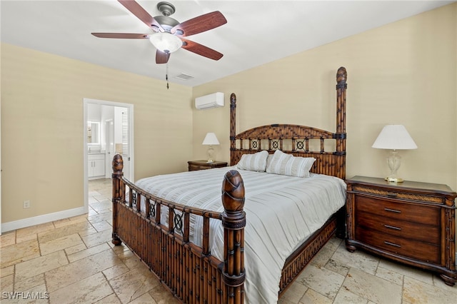 bedroom featuring a wall mounted AC, ensuite bath, and ceiling fan