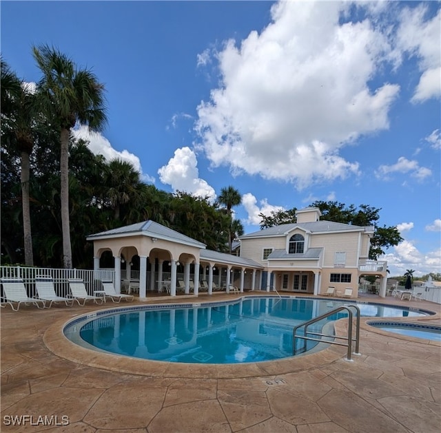 view of pool featuring a patio area