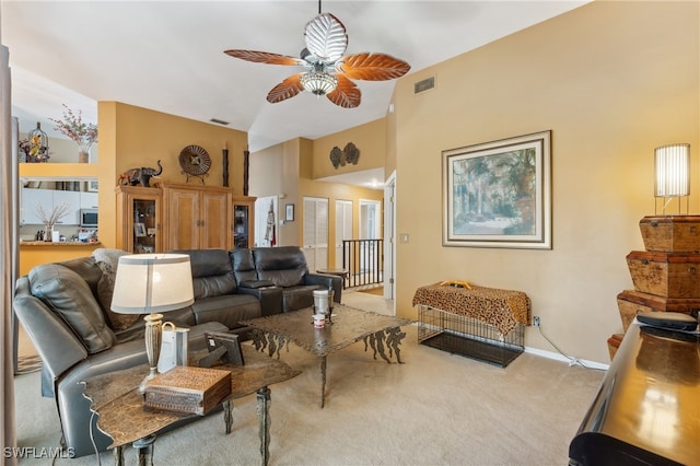 living room featuring carpet floors and ceiling fan