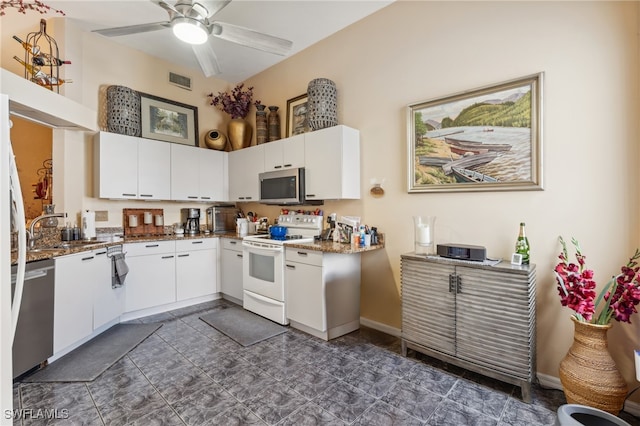 kitchen featuring white cabinetry, ceiling fan, and appliances with stainless steel finishes