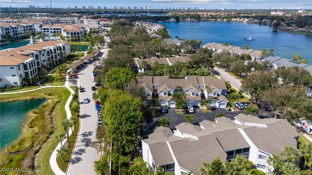 drone / aerial view featuring a water view