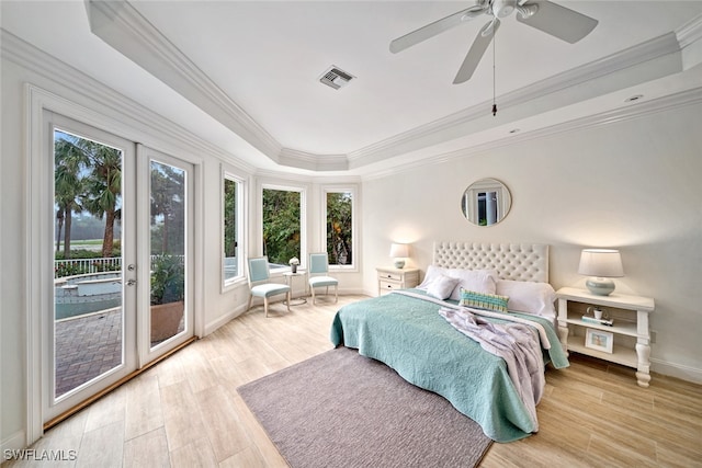 bedroom featuring ornamental molding, access to exterior, light hardwood / wood-style floors, and ceiling fan