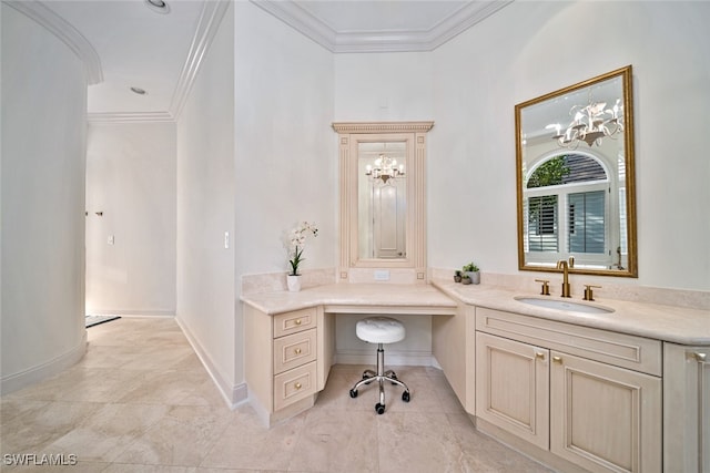 office space with built in desk, sink, crown molding, and an inviting chandelier