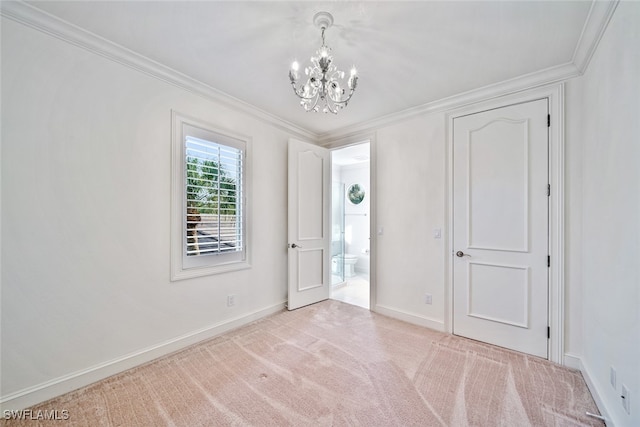 unfurnished bedroom with ornamental molding, light carpet, and an inviting chandelier