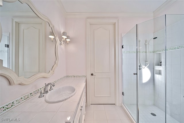 bathroom with vanity, crown molding, tile patterned floors, and an enclosed shower