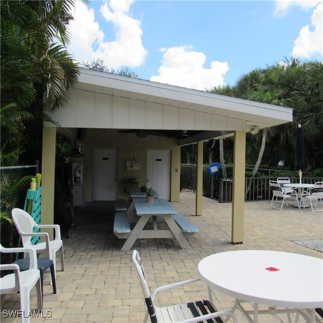 view of patio featuring ceiling fan and a gazebo