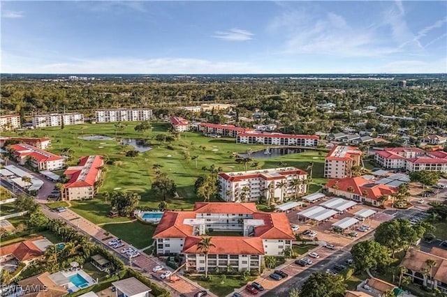 birds eye view of property featuring view of golf course