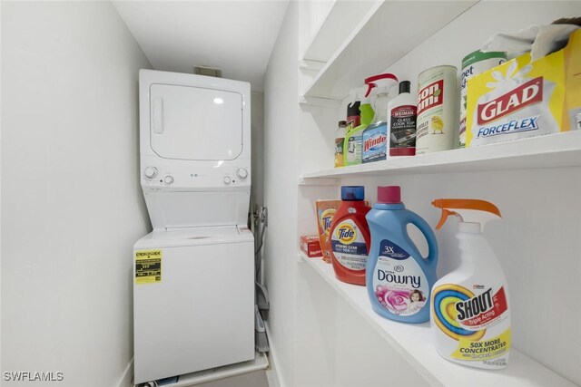 laundry area with stacked washer and dryer