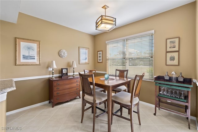 dining room featuring light tile patterned floors