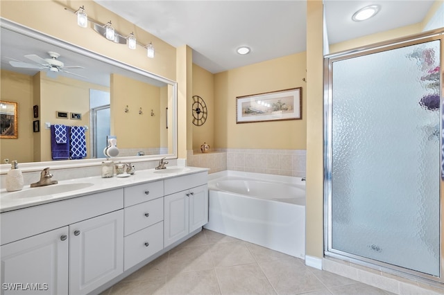 bathroom featuring tile patterned floors, ceiling fan, vanity, and shower with separate bathtub