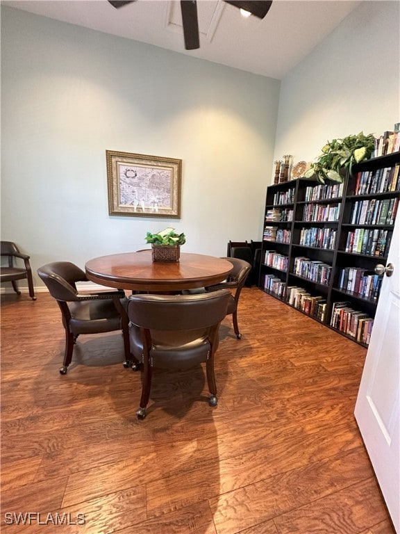 dining room featuring ceiling fan and wood-type flooring