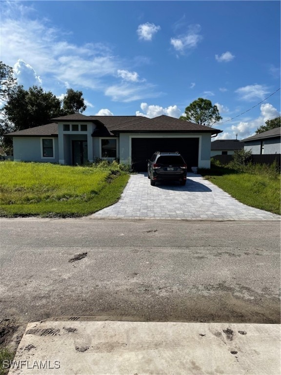 view of front of property featuring a garage