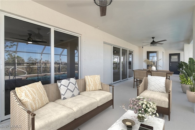 view of patio / terrace featuring an outdoor living space and ceiling fan